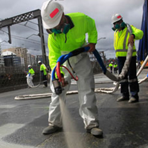 waterproofing-expert-spraying-concrete.jpg