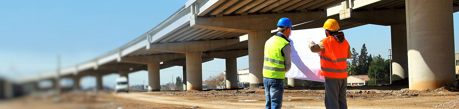 construction-workers-at-road-and-bridge-work-site.jpg